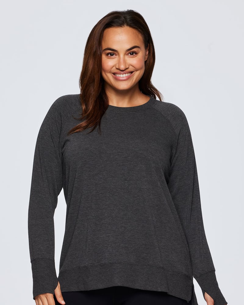 Front of a model wearing a size 1X Everyday Lightweight Sweatshirt in Charcoal by RBX Active. | dia_product_style_image_id:244875